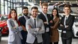 © Pascal - Team of happy salespeople are working together at car dealership