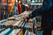 © AI_images - a person browsing vinyl records in a retro music store, with vintage decor and focused expression, promoting nostalgia and music culture.