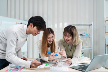 Wall Mural - group of ux developer and ui designer brainstorming about app interface design at modern office. cre