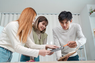 Wall Mural - asian business creative team work together, mobile application software design project. brainstorm m