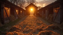 The Setting Sun Casts A Golden Glow Through A Rustic Barn Alley With Open Doors