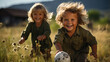 © AS Photo Family - Two young boys with wild hair laughing and playing a soccer game outdoors