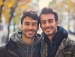 © pawimon - LGBT couple traveling Focus on a happy male couple, Caucasian, smiling and looking at the camera, exploring a new city, with right space for text