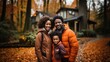 © AS Photo Family - Happy family with a child posing in front of their home during autumn