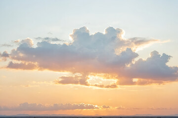 Wall Mural - Sunset Sky with Fluffy Clouds