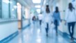© MR. INVINCIBLE - blurred image of doctor and patient people rush walking on hospital