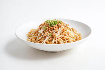 Wall Mural - Close-up of a plate of noodles with a white background