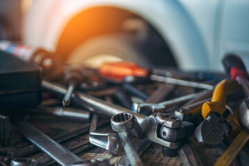 Mechanic tools engineering equipment car auto repair shop with copy space. Blurred background mechanical service. Heavy screw grungy rusted wrenches dirty screwdriver object. Industrial hardware set