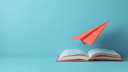 Open book with flying paper planes, isolated blue background.