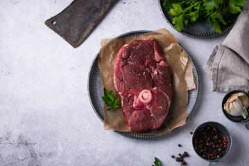 Raw uncooked lamb steak with spices