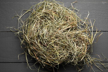 Poster - Dried hay on grey wooden table, top view