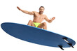 © Ljupco Smokovski - Man riding a surfboard and smiling