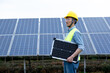 © zhu difeng - person working in solar power station