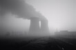 © yaqui_villegas - Stark black and white image of industrial cooling towers rising from the mist, symbolizing energy production