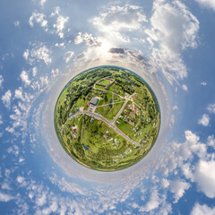 Wall Mural - simple tiny planet without buildings in blue sky with beautiful clouds. transformation of spherical 