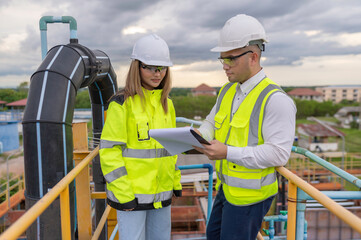 Environmental engineers work at wastewater treatment plants,Water supply engineering working at Water recycling plant for reuse