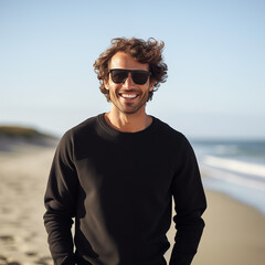 Wall Mural - Young man, guy, male, dad, one model black sweatshirt mockup mock-up mock up at the beach ocean photograph  