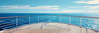 © Daniel - Ocean view with copy space image of a cruise ship deck and railing