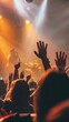 © olga_demina - Dynamic festival crowd with hands up enjoying live music under vibrant lighting. Captures the excitement and energy.