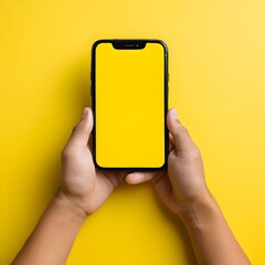 Wall Mural - Mock-Up Empty Yellow Mobile Screen, Close-Up of Man Holding Smartphone with Blank Screen on Yellow Background,

