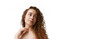 © master1305 - Beautiful young woman with perfect well-kept skin and natural curly hair posing isolated on white background. Concept of natural beauty, skincare, wellness, cosmetology, cosmetics. Banner for ad