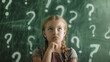 © IEPPEI - 考え込む少女と黒板のクエスチョンマーク