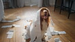 © stockbusters - Dog have fun toilet paper in apartment close up. Playful pet wrapped in napkins