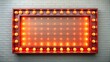 © artsakon - Red retro billboard lightbox with glowing neon light bulbs on white wall background