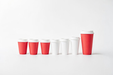 Sticker - Red and White Paper Cups on White Background