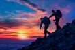 © Patthamaporn - Hiker helping friend reach the mountain with  sunset background, walking together