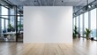 © naphat - A large white wall was in an office with light wooden floors and a modern design with glass walls. A mockup of the blank space was displayed. The room had concrete ceilings and lighting from windows