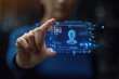 © Atchariya63 - A woman's hand holds a futuristic digital ID card with a holographic profile picture.