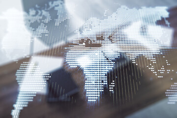 Wall Mural - multi exposure of abstract creative digital world map and modern desktop with laptop on background, 