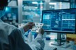 © Ahmed - Pharmacist holding a medicine packet and searching that product in the computer database, healthcare and technology concept