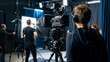 © VK Studio - Behind-the-scenes glimpse of a professional video camera filming in a studio.