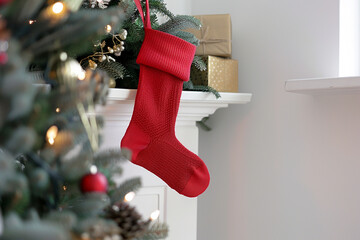 Wall Mural - A red sock Christmas festival mount on the wall, traditional merry x mas present day, surprise family time