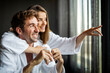 © NDABCREATIVITY - Relax, coffee and smile with couple at spa for luxury, vacation and romance.