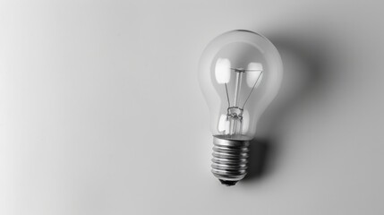 Poster - Light bulb against a white backdrop