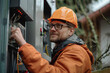 © Andrei - electrician installs an electrical panel. ai generated