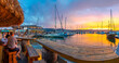 © robertharding - View of golden sunset, boats and restaurants at Knysna Waterfront, Knysna, Western Cape Province, South Africa