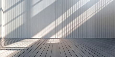 Poster - Minimalist interior with sunlight streaming through windows creating long shadows on a wooden floor and white paneled walls emphasizing simplicity and elegance
