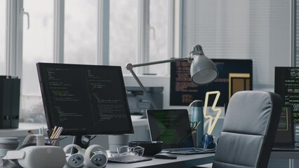 Wall Mural - no people shot of lines of sophisticated html codes on black background at computer monitors and lap