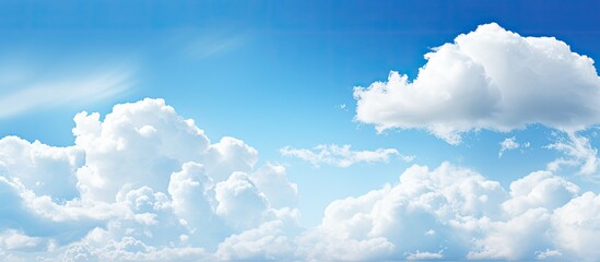 Canvas Print - White cumulus clouds in the blue sky Cloudy sky background. Creative banner. Copyspace image