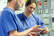 © Connect Images - Healthcare professionals discussing in a medical practice