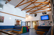 © Connect Images - Interior of a modern waiting area with a television in a medical practice
