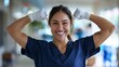 © LukaszDesign - Mockup of doctor, portrait, hospital achievement, medical trust, or empowerment. For woman healthcare, wellness leadership, or motivation, smile, joyful, or nurse in strong biceps