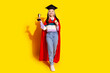 © deagreez - Full size photo of diligent woman wear red cloak academic hat hold goblet win first place isolated on vibrant yellow color background