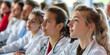 © nopommajun - An audience of medical students or professionals are pictured in an educational or conference setting, focused on a presentation