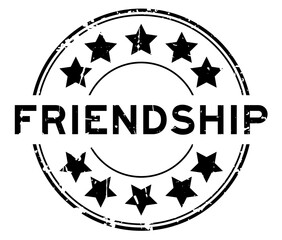 Poster - Grunge black friendship word with star icon round rubber seal stamp on white background