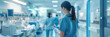 © nopommajun - In a well-equipped hospital environment, two nurses attend to their medical duties